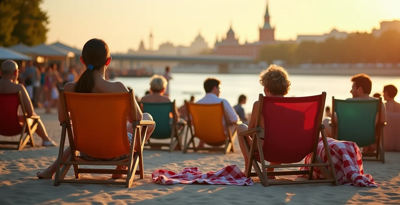 Urban beach scene with deck chairs along Moscow River embankment at Olive Beach